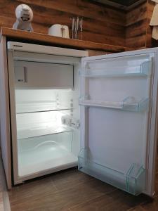 A kitchen or kitchenette at Borovets Gardens Apartment A27