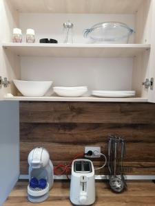 A kitchen or kitchenette at Borovets Gardens Apartment A27