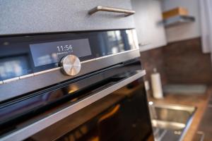 Cucina o angolo cottura di studio ROSELINE - smart & modern