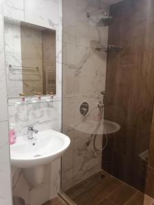 A bathroom at Borovets Gardens Apartment A27