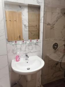 A bathroom at Borovets Gardens Apartment A27