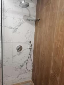 A bathroom at Borovets Gardens Apartment A27 Még 37 kép