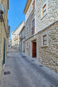 an empty street in an old stone building at Cas Comte Suites & Spa - Adults Only in Lloseta