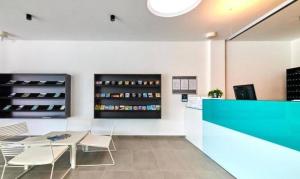 a store with a table and chairs in a room at Easyatent Camping Stella Maris in Umag