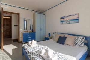 Katil atau katil-katil dalam bilik di Tignale Panorama