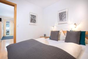 Ein Bett oder Betten in einem Zimmer der Unterkunft Zillertal Appartements