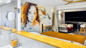 TV a/nebo společenská místnost v ubytování Official page "Residence Bleu Marine" - Sea View Apartments & Studios - Saint-Martin French Side