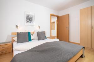 Ein Bett oder Betten in einem Zimmer der Unterkunft Zillertal Appartements