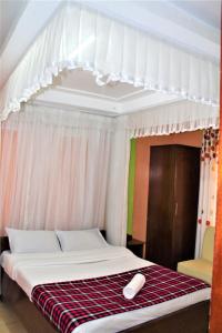 Postel nebo postele na pokoji v ubytování Hotel Kepler