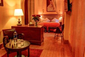 Postel nebo postele na pokoji v ubytování Casa Lila & Spa