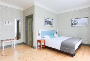 Llit o llits en una habitació de Fosshotel Eastfjords