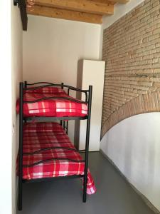 Postel nebo postele na pokoji v ubytování B&B La Corte del Segrino
