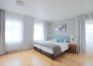 Llit o llits en una habitació de Fosshotel Eastfjords