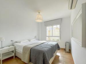 Una cama o camas en una habitación de Mary Montana