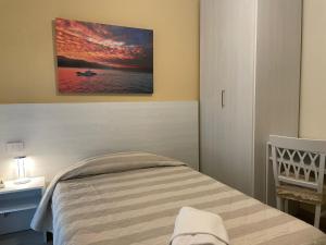 Postel nebo postele na pokoji v ubytování Hotel Ristorante Miramare