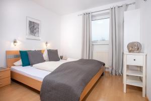 Ein Bett oder Betten in einem Zimmer der Unterkunft Zillertal Appartements