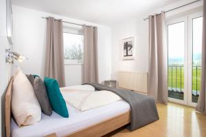 Ein Bett oder Betten in einem Zimmer der Unterkunft Zillertal Appartements