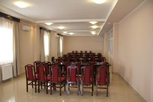a room with a bunch of chairs in it at Hotel Feniks Požarevac in Požarevac