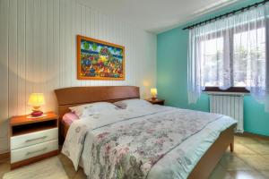 Postel nebo postele na pokoji v ubytování Apartments Sonja Zambratija