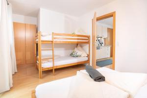 Ein Bett oder Betten in einem Zimmer der Unterkunft Zillertal Appartements