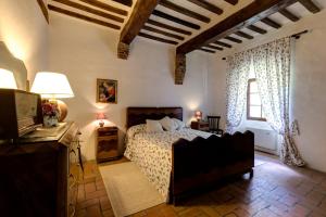 Postel nebo postele na pokoji v ubytování Casa di Nonna Nuccia