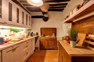 Kuchyň nebo kuchyňský kout v ubytování Casa di Nonna Nuccia + 15 fotografií