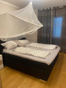 Postel nebo postele na pokoji v ubytování Villa Birk