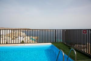 The swimming pool at or close to Relax Inn Hotel