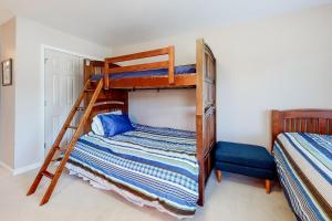 a bedroom with two bunk beds and a bed at Sea Colony - 56032 Great Pine in Bethany Beach +48 photos