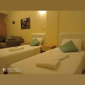 Postel nebo postele na pokoji v ubytování Hotel NilSu