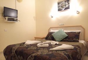 Postel nebo postele na pokoji v ubytování Hotel NilSu