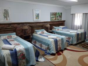 Postel nebo postele na pokoji v ubytování Gracias Guest House + 83 fotografií