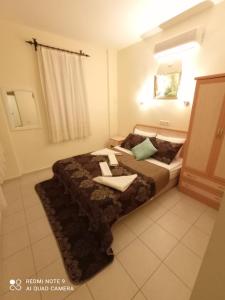 Postel nebo postele na pokoji v ubytování Hotel NilSu