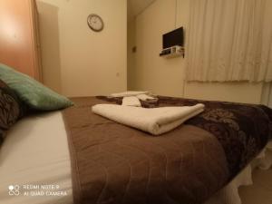 Postel nebo postele na pokoji v ubytování Hotel NilSu