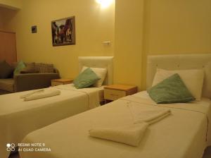 Postel nebo postele na pokoji v ubytování Hotel NilSu