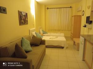 Postel nebo postele na pokoji v ubytování Hotel NilSu + 37 fotografií