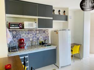 Η κουζίνα ή μικρή κουζίνα στο Loft london, charme e estilo no coração de Icarai