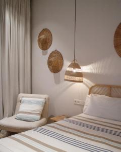 Łóżko lub łóżka w pokoju w obiekcie Casa du Soleil Hostal Boutique