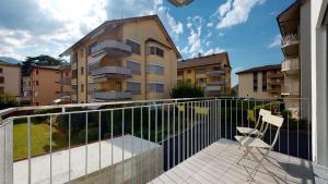 Balcone o terrazza di Nonanteneuf appart hōtel Aigle - contactless check-in