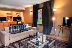TV a/nebo společenská místnost v ubytování Apartaments Sant Bernat