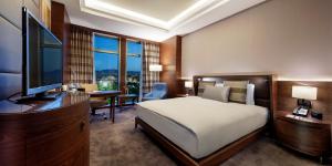 Телевизор и/или развлекательный центр в Movenpick Hotel Malatya
