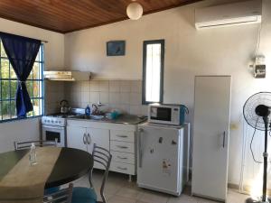 Kjøkken eller kjøkkenkrok på La Casa Azul: tranquilidad y esparcimiento en un entorno natural