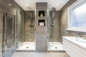 a bathroom with a shower and a sink at Host & Stay - The Seel Street Townhouse in Liverpool +86 photos