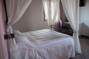 Fattoria L'Olmetto客房内的一张或多张床位