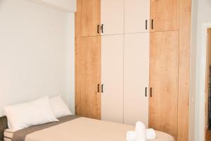 Posteľ alebo postele v izbe v ubytovaní Comfy Central Apartment