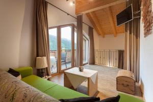 TV a/nebo společenská místnost v ubytování Gasthaus Dorfberg