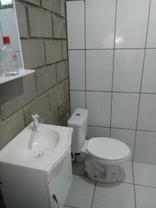 Ett badrum på Sitio Santo Antonio HOSTEL