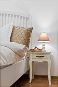 Postel nebo postele na pokoji v ubytování Institutul Național de Neurologie - Sudului 303 by MRG Apartments