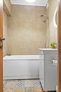 Koupelna v ubytování Institutul Național de Neurologie - Sudului 303 by MRG Apartments