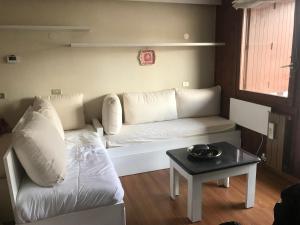 Posedenie v ubytovaní Appartamento con vista unica Condominio Grand'Ourse
